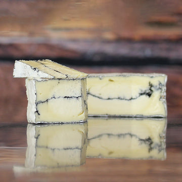 A 1/2-pound wedge of Lost Lake Farm's farmstead cheese, part of the Root to Rise CSA cheese add-on.